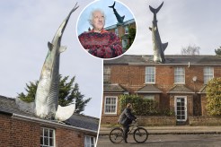 Ziya Şengül and Taron Egerton near a man riding a bicycle next to a shark statue
